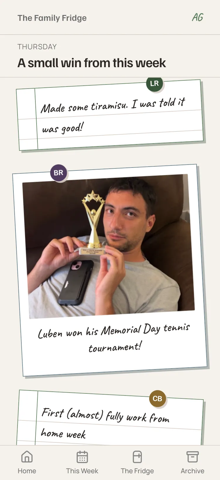 The styled Family Fridge on the Thursday prompt “A small win from this week,” showing a handwritten note about making tiramisu and a polaroid of someone holding a tennis trophy.